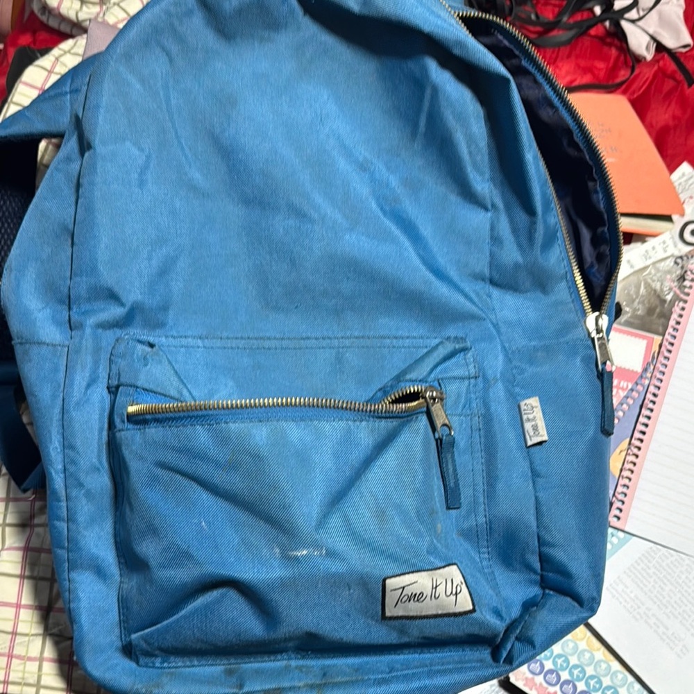 Tone it up Blue Backpack. TIU fan. A little dirty on the straps and front.